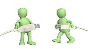 Two figures connecting cables